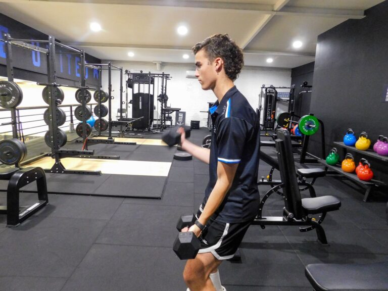 Melbourne United Sport & Business Program Student using the gym at Hoop City